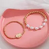 Strand Designer Model Fashion Gold Pearl Beaded Armband för kvinnor utan att bleka Hip Hop Trend Daily Party Jewets Gifts