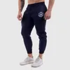 Calças masculinas Sportswear Fitness Homens Ginásios Skinny Sweatpants Outdoor Cotton Track Pant Bottom Jogger Calças Workout Corredores