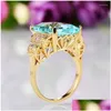 Anillos Zhouyang Anillo para mujer Lujo Color dorado claro Circón azul en los dedos Regalo de joyería Accesorios al por mayor Kbr41 Entrega directa Dhj87