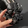 Haargummibänder Designer Marke Luxus Neues Leder Charm Seil Herbst Mädchen Niedlicher Stil Schwarz Geschenkdesign für Frauen Romantischer Schmuck DSLU