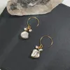 Boucles d'oreilles pendantes Lii Ji véritable perle Keshi avec de minuscules bijoux faits à la main remplis d'or américain 14 carats