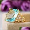 Anillos Zhouyang Anillo para mujer Lujo Color dorado claro Circón azul en los dedos Regalo de joyería Accesorios al por mayor Kbr41 Entrega directa Dhj87