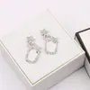 Pläterade 925 Silver Luxury Brand Designers Letters Stud Geometric Famous Women Round Crystal Rhinestone Earring Wedding Perty Jewerlry Circular Diamond Ruby 8337