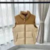 Haute qualité Designer Down Vest vestes de poche femmes Parkas fermeture éclair manches longues Badges hommes bas manteau décontracté gilets