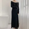 基本的なカジュアルドレスフランスのエレガントなワンショルダーツイストデザインニットドレス女性冬のVネックビッグスイング長いセータードレス2024