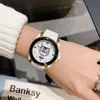 Pareja clásica Reloj de cuarzo con bisel de cerámica negro Patrón de buceo geométrico Reloj de pulsera CAT Relojes con dijes de estrellas geométricas Mujeres Hombres Wh295Q