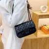 Koreansk version doftkedja sommaren nya kvinnors lilla färskt märke axel dopamin crossbody väska fabrik online 70% försäljning