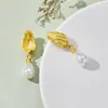 Orecchini di perle di conchiglia dorata di alta qualità MoonRiverJewel Designer di gioielli alla moda