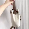 Fashion Designer bag Hand-held crossbody bag Bucket bag 16X18cm cream canvas with chocolate shoulder strap color and gold buckle too OK