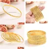 Charm Bracelets 8Pcs 68Mm Diameter Big Women Dubai India Girls Bangle 24K Gold Color Bracelet African Arabicethiopian Bride Drop Deliv Dh1Xs