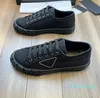 Scarpe da ginnastica in pelle di tela bianca nera di design sportivo Scarpe con suola in gomma Slip-on da esterno per uomo Skateboard Walking Calzature all'ingrosso