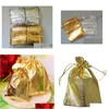 Titulaires de faveurs Sacs d'emballage en tissu doré / argenté Pochettes à bijoux Favorise le sac cadeau de fête de Noël 7x9cm / 9x12cm Événements de livraison directe Suppl Dhpdl