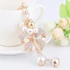 Nowy moda luksusowy projektant Diamond Rhinestone Cute Bow Pearl Work Charms Tassel Bierek Białe Gold335Q