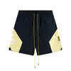 INS-märkesdesigner Mens Shorts High Street Rhude Short Brodery Colored Tie Cord Elastic Men's Women's Casual Unisex Split Shorts Fifth Pants European S-XL