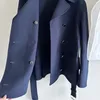 Jaquetas femininas 2023 inverno vintage jaqueta de lã design chique duplo breasted lapela cinto cintura comprimento médio casaco mulheres moda de escritório