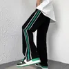 Pantaloni da uomo coreano Fahion pantaloni a righe laterali da uomo pantaloni sportivi larghi autunno streetwear uomo pantaloni larghi a gamba larga pantaloni da jogging oversize maschili 231005