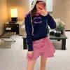 Jeans pour femmes Designer Qualité 2023 Début du printemps Nouvel âge réduit Petit style de parfum Taille haute Slim Ruffle Flower Bud Denim Shorts QBFZ