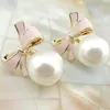 Clip-On skruv Korea Style Clip on Earring No Pierced for Women Simulated Pearl Charm Pink White Bowknot EarringsClip-On319C