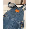 Kobiety Jumpsuits Rompers Mexzt Jumpsuits Women Streetwear Denim kombinezon vintage luźne swobodne spodnie na nogawki Pasek wysokiej talii proste dżinsy spodnie NEWL231005