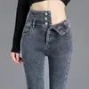 Jeans da donna termici invernali in pile spesso a vita alta pantaloni skinny caldi da donna con bottoni elasticizzati pantaloni mamma casual in velluto 231005