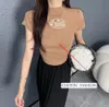 GZ Été doux et épicé rayé robe en tricot femmes taille mince hanche portefeuille jupe courte couleur contrastante élégant licou cou chic jupe avec des