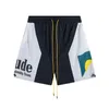 2023 na moda marca designer mens shorts rhude pôr do sol carta impressa hip hop homens e mulheres casuais esportes quinto calças europeias s-xl