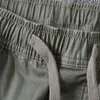 メンズパンツのズボンの真ん中のウエスト伸縮性のあるスポーティなヴィンテージクロップ