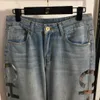 GZ SML Designer Sexig ny modetryckt kvinnors jeans höga midja blå vit casual blyertsbyxor