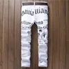 Zerrissene Männer bedruckte Hosen Jeans Denim Europäische und amerikanische Zeitungsdruck Slim-Fit lässige gerade Hose male185z