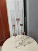 Clear Sticks Candle Holder z metalową podstawą