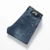 Mäns jeansdesigner 2023 Autumn and Winter New Pants Slim Fit Small Straight Elastic Mid Rise Luxury Brand Dark Blue Denim W6nj