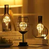 Bordslampor 2023 Ny LED Red Wine Bottle Night Light Nordic Iron Art Hollow Out Table Lamp för Cafe Hotel Home Bedroom Decoration Desk Light YQ231006