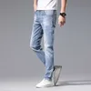 Herr jeans designer 2023 våren high end fötter elastisk smal fit koreanska blå denim byxor 6ick