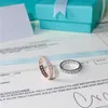 Tshou Classic 925 Sシルバーラウンドジルコンウェディングリング2つのColor284oの女性のための結婚指輪