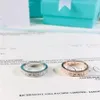 Tshou Classic 925 Sシルバーラウンドジルコンウェディングリング2つのColor284oの女性のための結婚指輪