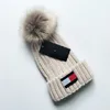 Automne Canada chapeau tricoté bonnet de luxe hiver hommes et femmes unisexe logo brodé laine d'oie mélangée chapeaux AAA