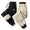 Corredores calças casuais 2022 calça de inverno masculino calças esportivas cordeiro cashmere grosso calças quentes treino bottoms moletom magro 6xl 247v