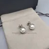 Mujer Pendientes gratis populares Envío Diseñador de lujo Bijoux Pendiente Joyería de moda Conjunto de cuatro garras europeo y americano Pendientes de mujer con cuentas Regalo de boda