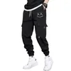 Herrbyxor streetwear hiphop joggers män brev band lastfickor spår taktiska avslappnade manliga byxor Sweatpant x9