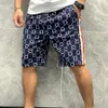 Diseñadores para hombre Shorts Secado rápido Swim Wear Letras elegantes Impresión Pantalones cortos para hombres y mujeres 2023 Summer Board Beach P303W