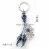 Chaveiros Azul Evil Eye Chaveiro Borboleta Elefante Palm Charms Anel para Mulheres Homens Pingente Saco Acessórios de Carro Drop Delivery Jóias Dhwxh