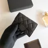 Kobiet luksusowy projektantka mody Uchwyt karty Fold Flap Classic Wzór kawiorowy Sheepsin Black Mini torebka dla kobiet z pudełkiem.