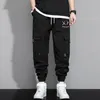 Herrbyxor streetwear hiphop joggers män brev band lastfickor spår taktiska avslappnade manliga byxor Sweatpant x9