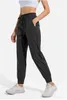 Pantalon de jogging de yoga pour femme avec poches, taille haute, doux, élastique, décontracté, parfait pour le fitness et le yoga, jambes avec cordon de serrage pour un ajustement réglable.