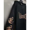 デザイナーBalencaigaity Paris Refort Edition B Family 2024 Sanskrit Letter Print Hand Painted Aded Out Men's and Women's Hooded Seater Balanciaga