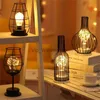 Bordslampor 2023 Ny LED Red Wine Bottle Night Light Nordic Iron Art Hollow Out Table Lamp för Cafe Hotel Home Bedroom Decoration Desk Light YQ231006