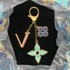 Flores tricolor designers porte-clés pendentif V lettres porte-clés haut voiture porte-clés boucle bijoux porte-clés sacs décoration pendentifs cadeau exquis