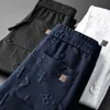 Designer Clothing TrackSuits Fashion Pant New Casual Spods Proste modne stóp krawat Slim Fit Sports Strażowe dla mężczyzn Rozmiar odzieży sportowej M-5xl