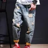 Męskie dżinsy z drukowanymi dżinsami Męskie Zamknięte Retro Koreańskie mody Man Cowboy Pants Graphic Torn Slim Fit Tut Holes