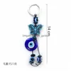 Key Rings Blue Evil Eye Keychain Butterfly Elephant Palm Charms Ring For Women Men Pendant Bag Car Accessories Drop Delivery Dhgarden Dh2Dy
